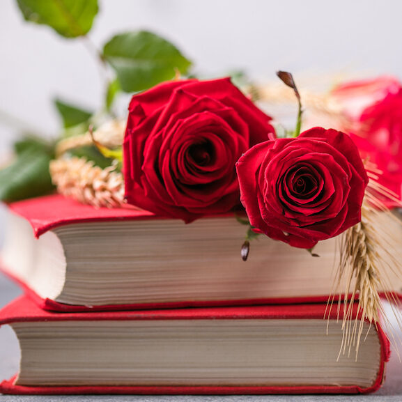 Romance Novels - book with roses